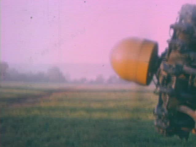 vintage biplane prop propeller & aircraft landing on strip runway 