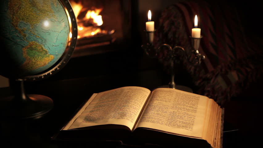 Terrestrial globe and old book