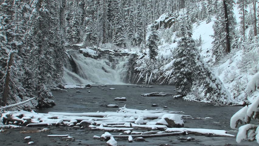 Winter scene on waterfall in Southern Yellowstone