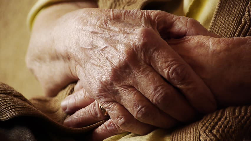 Senior old woman face wrinkle skin close up 