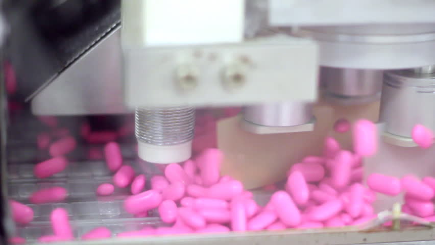 Production line for tablet (pill) sorting and packaging.  HD 1080p.