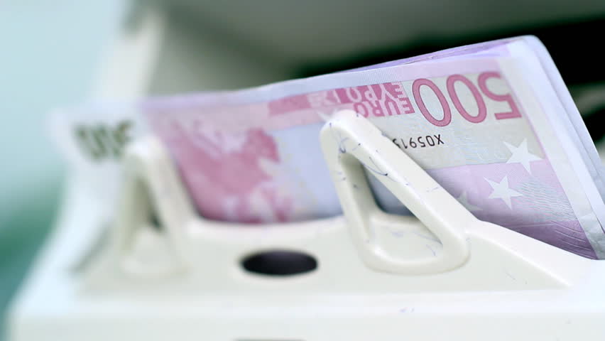 An electronic money counter processing Euro 500 bills.  HD 1080p.
