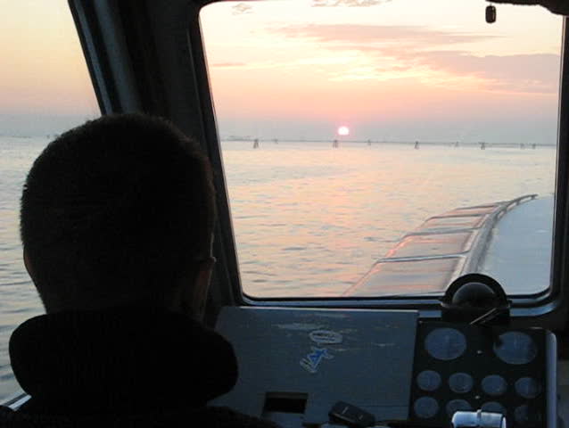 Venice: Lagoon Sunset viewed from a boat cockpit