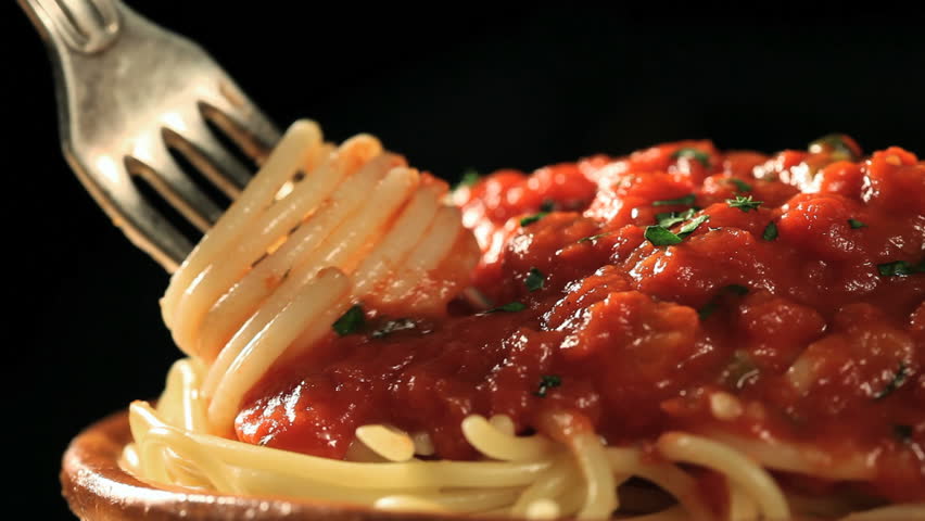 twisting fork with pasta and taking the  fork away