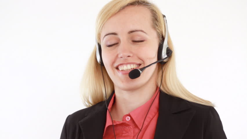 Attractive helpdesk consultant talking on headset, isolated on white