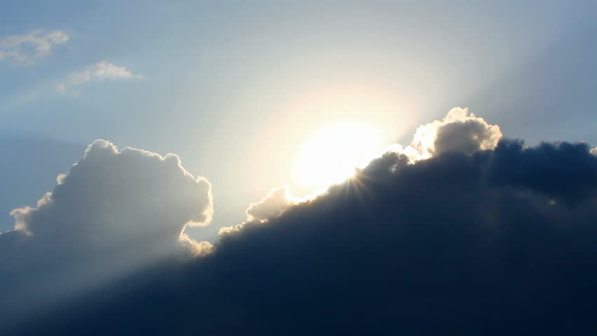 timelapse with sun behind clouds
