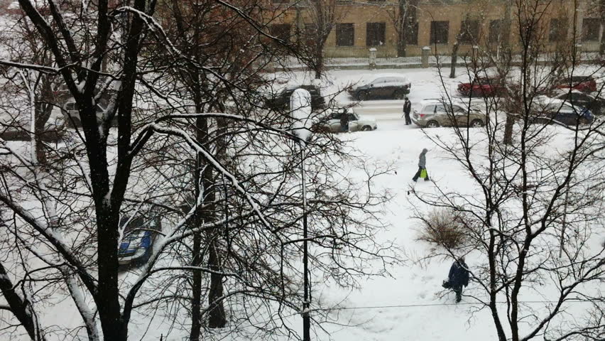 Aerial view of snowfall on city street