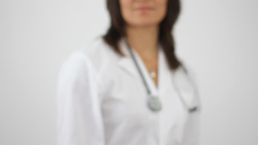 Female doctor offering pills in blister, isolated