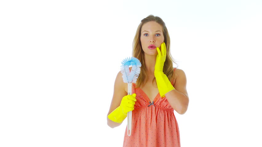 Woman posing with toilet brush