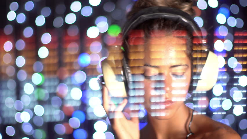 close up shot of sexy female dj dancing and playing records, slow motion