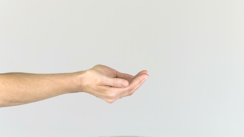 Hands receiving water filmed at 1,000 frames per second