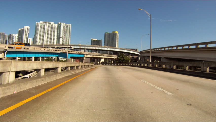MIAMI, FLORIDA - AUGUST 4: Vehicle POV, driving the highway near Downtown Miami, August 4th, 2011 in Miami, Florida. 