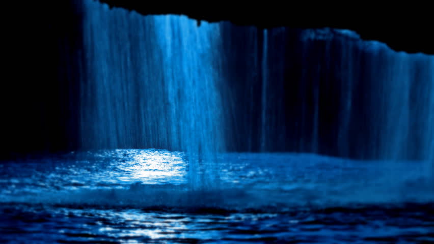 River cave under the waterfall Zarecki krov with water falling
