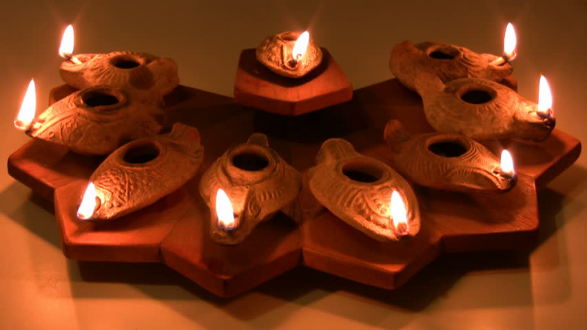 Hanukia made of ancient clay olive oil lamps