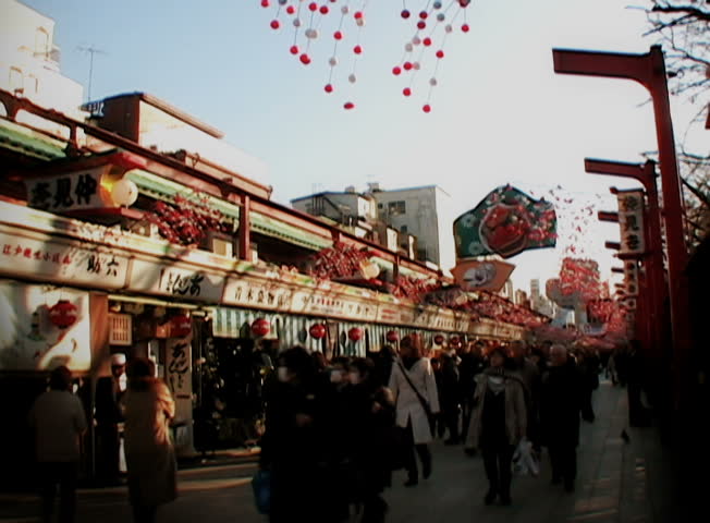 YOKOHAMA, JAPAN - CIRCA DECEMBER 2007 - Crowded Japanese market street, circa December 2007. Yokohama is the capital of Kanagawa and the second largest city in Japan by population after Tokyo.