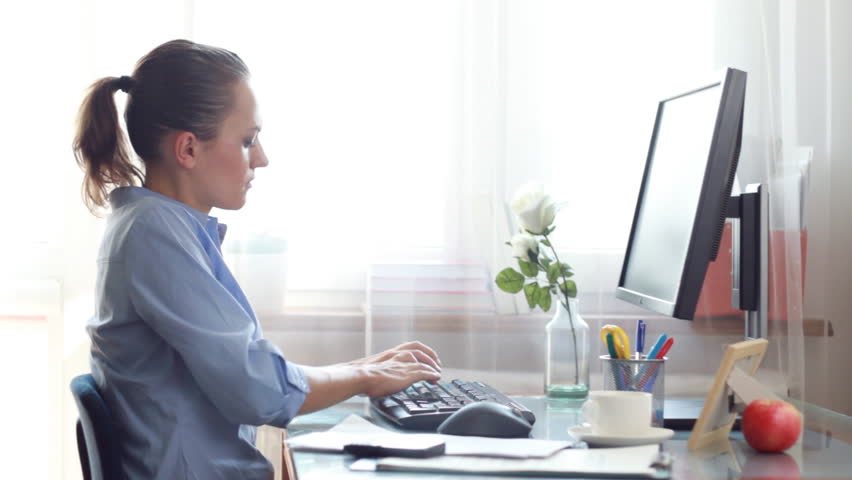 Busy multitasking attractive businesswoman in the office timelapse