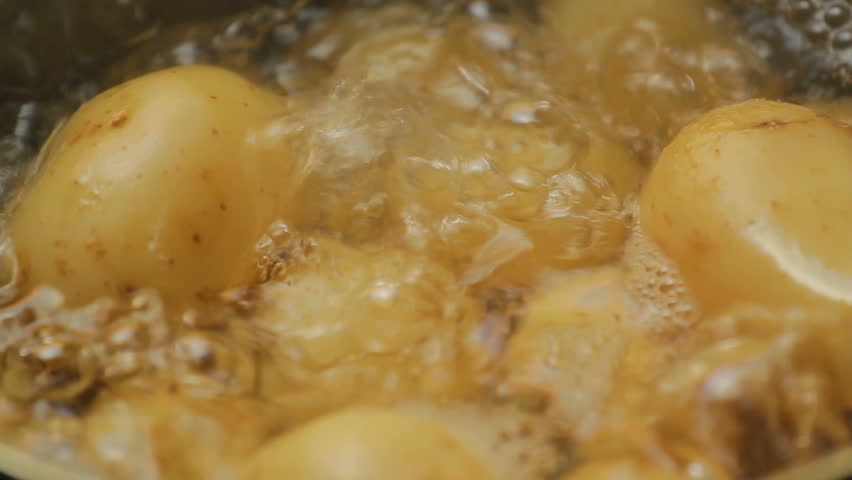 boiling water with potatoes