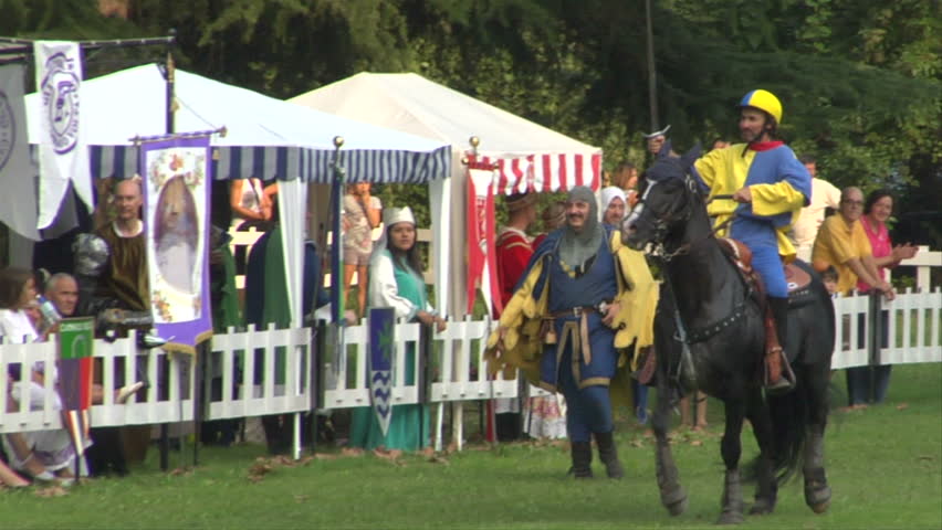 COMO, ITALY - CIRCA SEPT 2011:  Palio del Baradello re-enacts Barbarossa's visit to his allies in Como after defeating Milan in the 1159 battle, circa Sept 2011, Como, Italy. Period dances, games and shows create a medieval atmosphere at this annual event