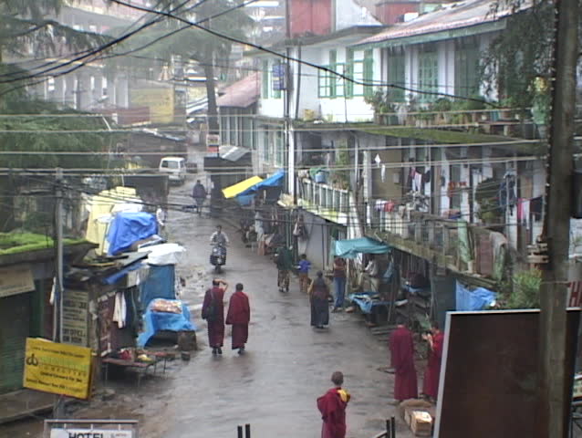 DHARAMSALA, INDIA - CIRCA 2010: Rain falls on the Buddhist village of Dharamsala, India circa 2010 in Dharamsala, India. Several thousand Tibetan exiles have now settled in Dharamshala, where they have built monasteries, temples and schools.
