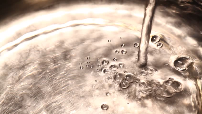 Close-up of kitchen sink with water drops