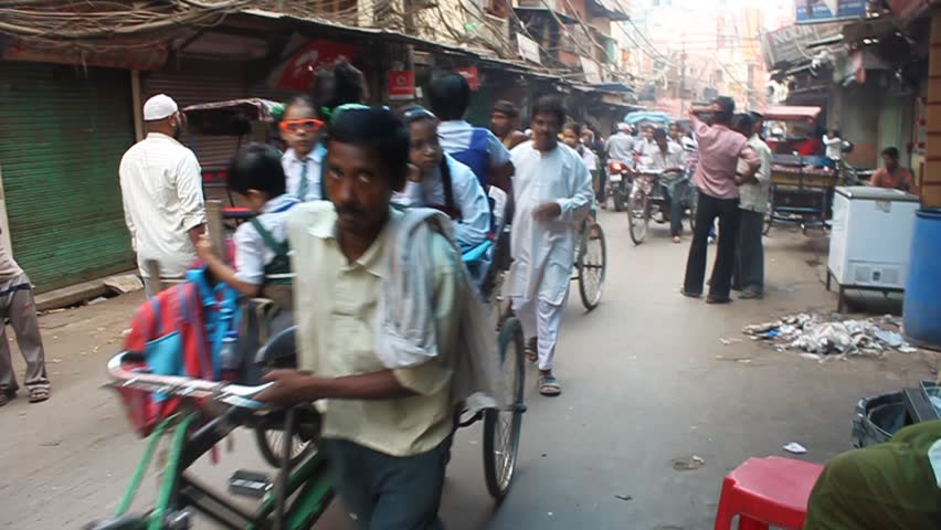 OLD DELHI, INDIA - AUGUST 3: Morning road traffic, August 3, 2011 in Old Delhi, India. Today, despite having become extremely crowded and dilapidated, Old De still serves as the symbolic heart of metropolitan Delhi.
