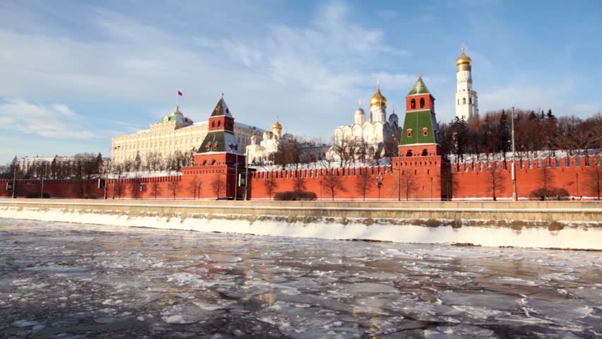Red brick walls of famous Kremlin and Ivan Great Bell Tower at winter in Moscow, Russia