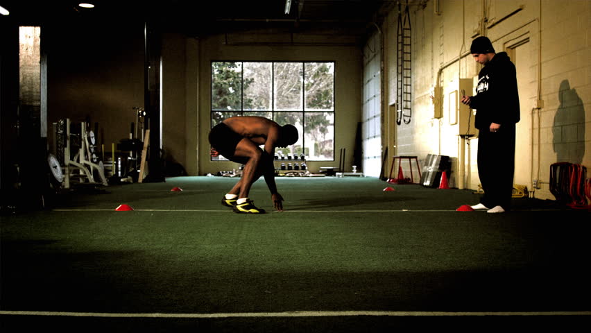 A muscular African male works out. Footage provided in both an extreme color grade and the basic color grade.