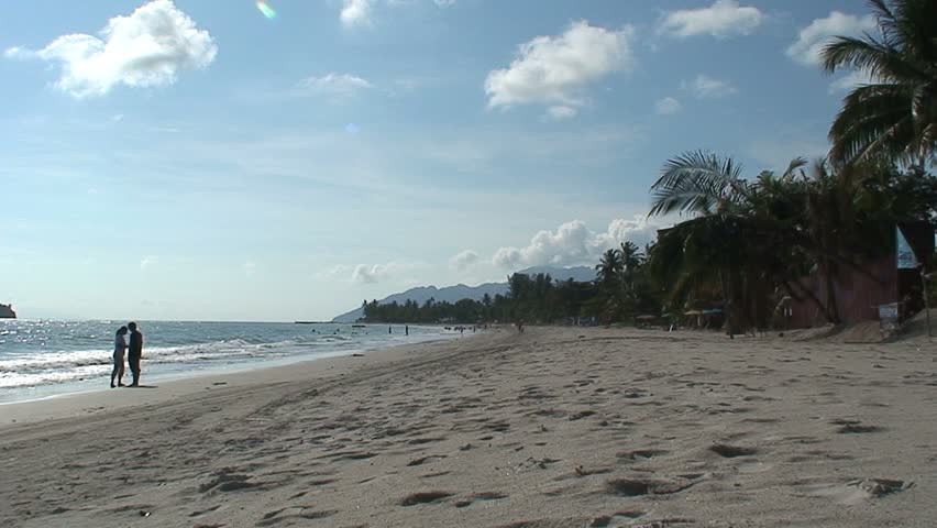 People enjoying a beach in Malaysia