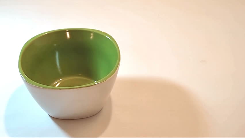 Preparing cornflakes with milk