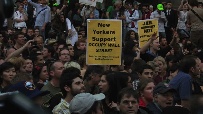 NEW YORK - SEPT 30: Protesters congregate outside One Police Plaza in Lower Manhattan on Day 14 of Occupy Wall Street, September 30, 2011 in New York. 