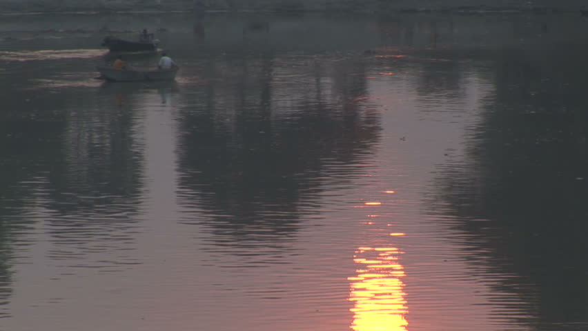 Sunset reflections on the river Ganges