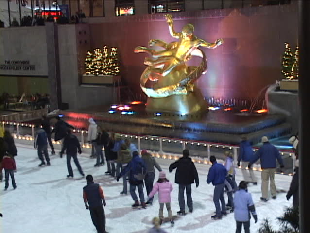 NEW YORK, NY - CIRCA 2005: Ice skaters make their way around the Rockefeller Center ice rink in winter circa 2005 in New York.