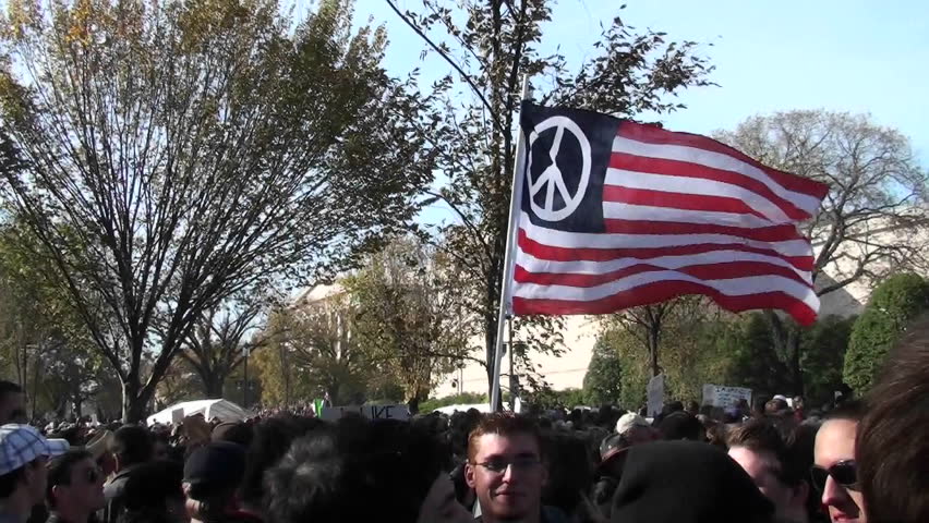 WASHINGTON, DC - CIRCA 2010: A peace flag flies at a political rally circa 2010 in Washington DC.