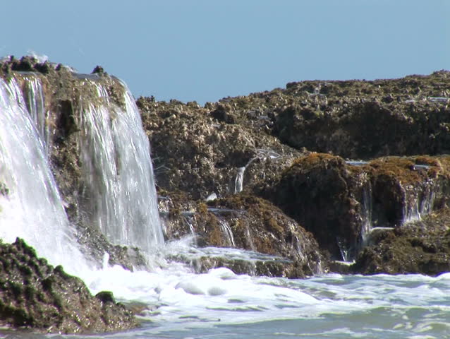 Close up Of Sea Crashing over Old Reef