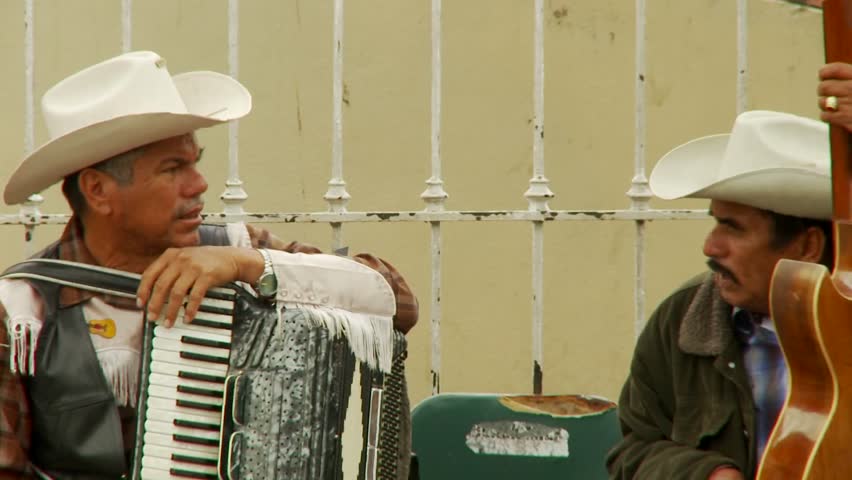 TIJUANA, MEXICO - CIRCA 2009: musicians chat in downtown circa 2009 Tijuana Mexico