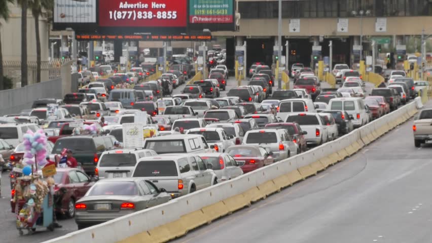 Cars wait at the US Mexico border to cross back into the United States from Tijuana.