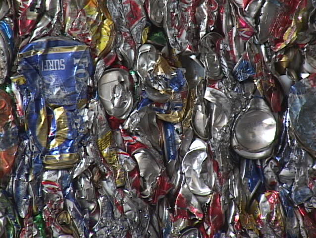 SANTA BARBARA, CA - CIRCA 2009: Blocks of aluminum cans get stacked at a recycling center circa 2009 in Santa Barbara.