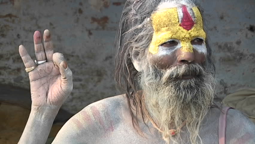 KATHMANDU, NEPAL - CIRCA 2005: Hindu Sadhus posing with religious hand gesture at Pashupati Temple circa 2005 in Kathmandu.
