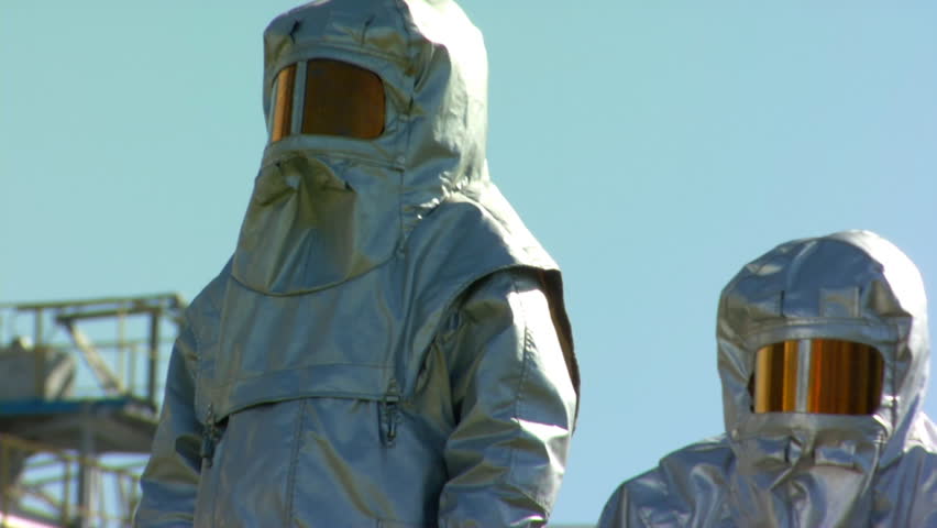 People in protective suits 