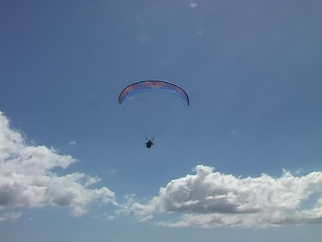 Para gliding from the rocks in Portugal