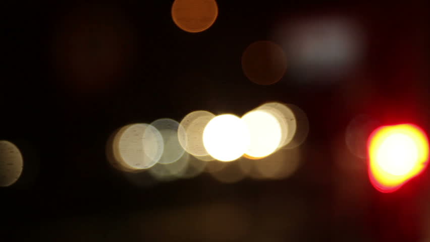 De-focused car lights at night.
