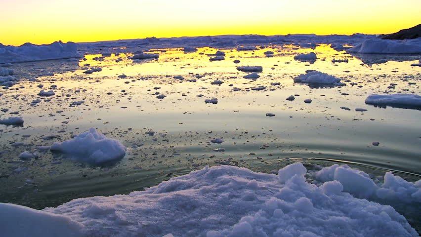 Moving Ice Floes at Sunset