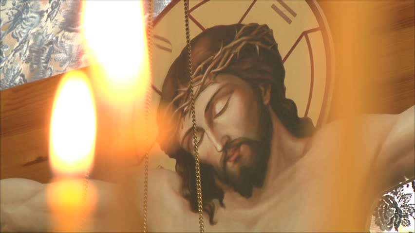 Jesus, shot through candles, soft focus
