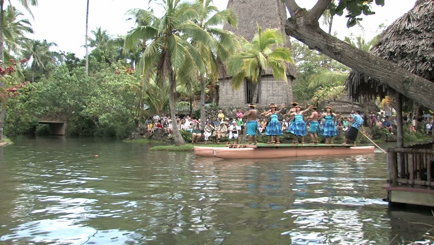 Polynesian Cultural Center, Oahu, Hawaii. Students from Brigham Young University demonstrations. LDS or Mormon church. Boat or canoe representing Hawaii culture with dancers. Editorial use. 