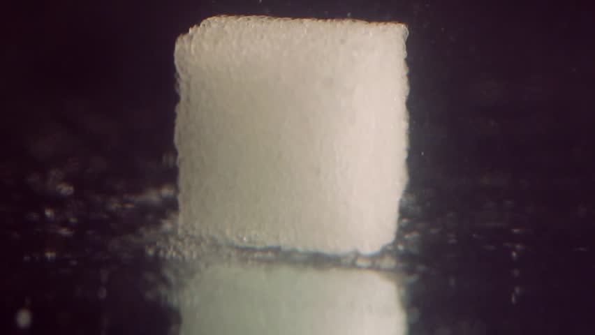 Sugar dissolves in Water.