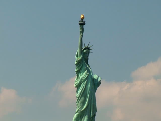 Zoom out of New York Statue of Liberty to Wide
