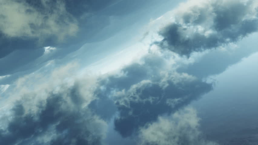 flying through cloudy blue sky 