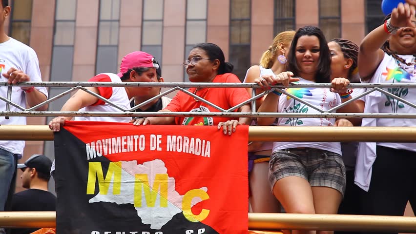 SAN PAULO, BRAZIL - CIRCA JUNE 2011: Crowds celebrate the LGBT Gay Pride Parade on Avenida Paulista circa June 2011 in San Paulo.