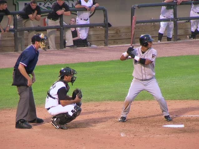 Catcher stops low pitch
