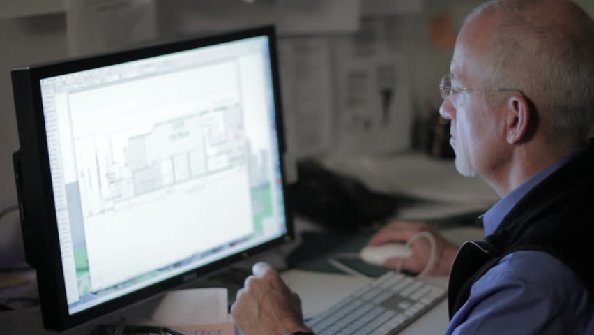Architect working on his computer